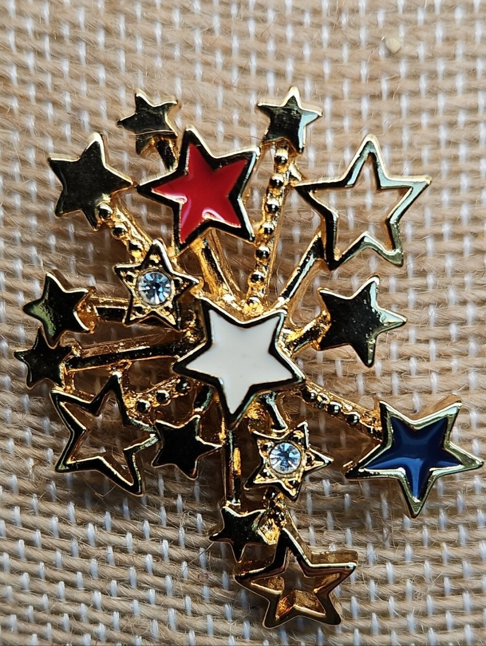 Avon Gold Tone Starburst Brooch with Red, White & Blue Enamel